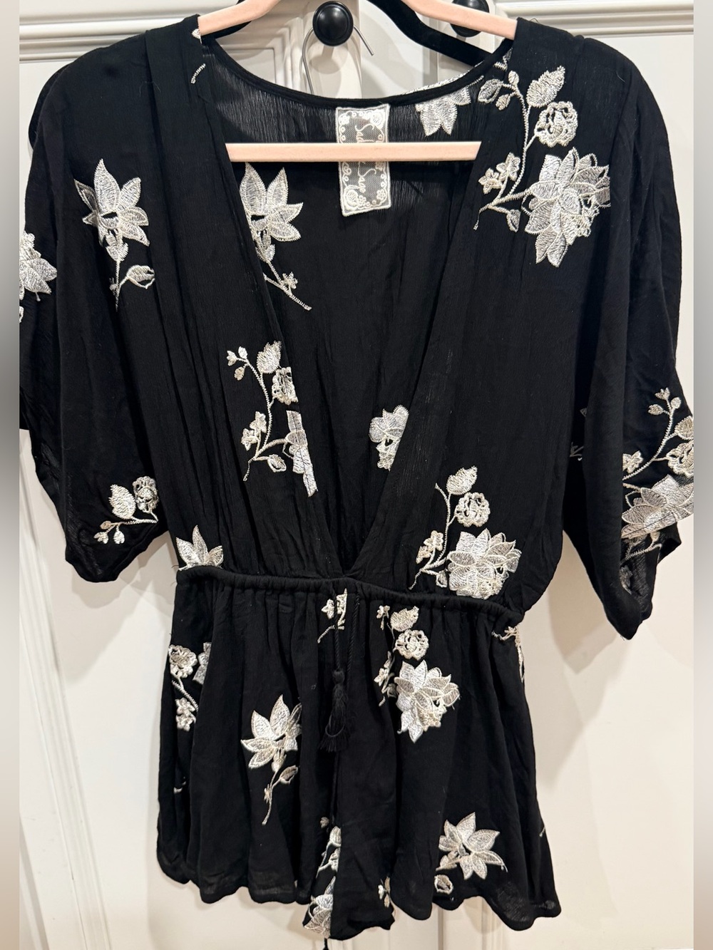 Sadie & Sage Black Romper with White Floral Embroidery